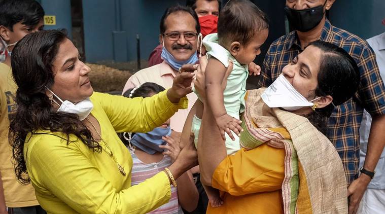 Dr Mary Anitha (left) with six-month-old Elvin and his parents in Kochi. (PTI)