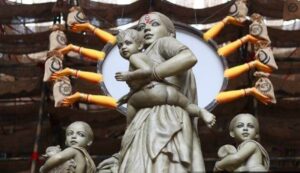 Durga Puja pandals in Bengal represents Goddess Durga idol with migrant workers