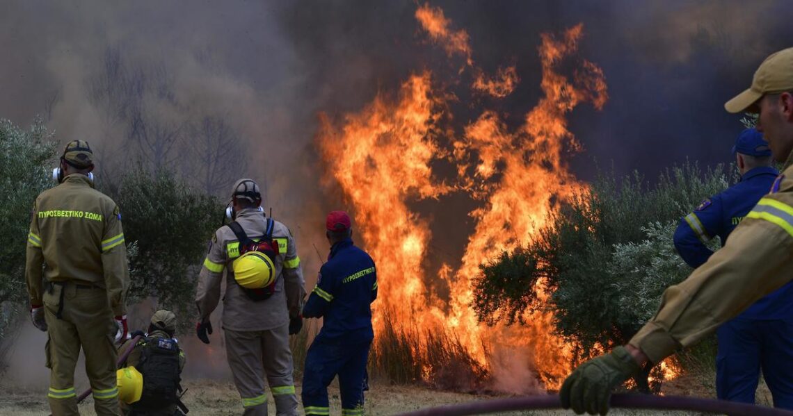 Wildfires reignited outside Athens; evacuations took place once again in Southern Greece
