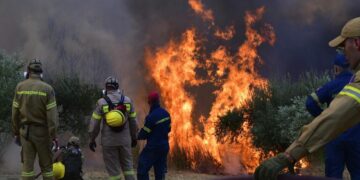 Wildfires reignited outside Athens; evacuations took place once again in Southern Greece