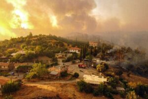 Wildfires rage in Southern Europe as heatwave peaks temperatures to more than 40C; hundreds of people evacuated