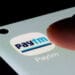 Paytm, the biggest digital payment firm makes languid market debut, stock lists at 9% debut