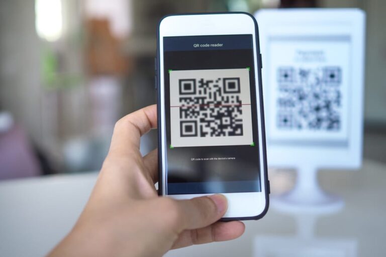 Customer scanning a UPI QR code with a smartphone to make a small payment