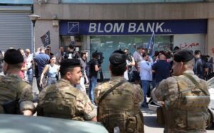 Explained | Lebanon’s economic meltdown and why people are robbing banks for their own money