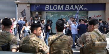 Explained | Lebanon’s economic meltdown and why people are robbing banks for their own money