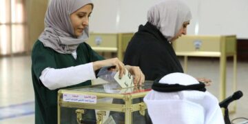 Women return to Kuwait national assembly as opposition wins majority in parliament