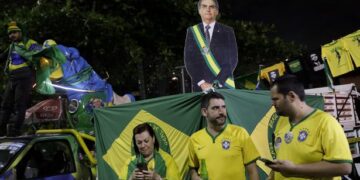 Bolsonaro, Lula headed to runoff after tight Brazil election