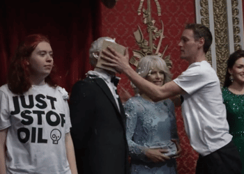 Climate activists smear King Charles’ wax figure with cake