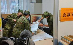 North Korea fires missile over Japan, stopping trains and sparking warning message