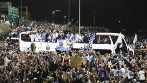 Argentines dance, cry and cheer in streets as World Cup winners return