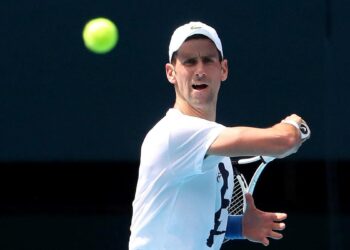 Djokovic back in Australia a year after being deported