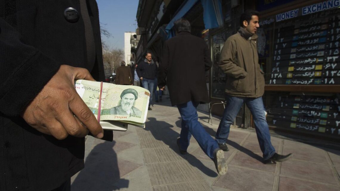 Iran’s currency falls further against the dollar amid unrest