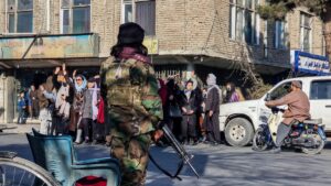 Taliban use water cannon on women protesting university ban