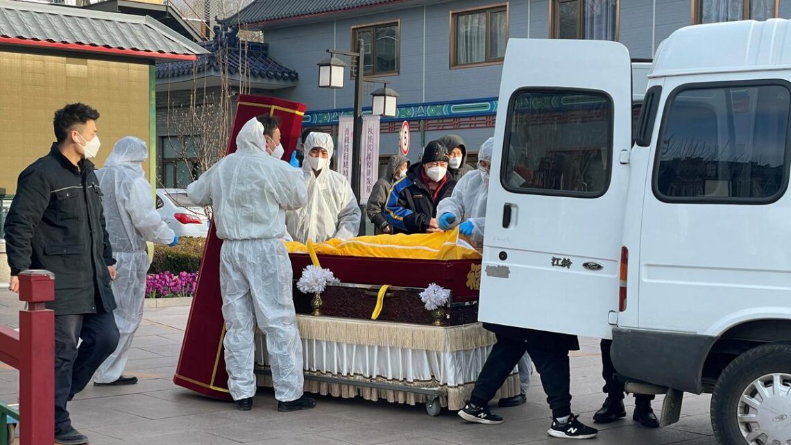 China logs nearly 13,000 Covid deaths in a week
