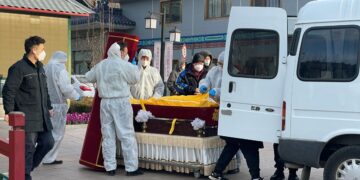 China logs nearly 13,000 Covid deaths in a week