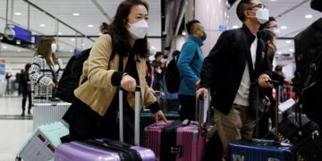 China reopens borders in final farewell to zero-COVID