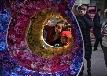 China says Covid deaths down by nearly 80%