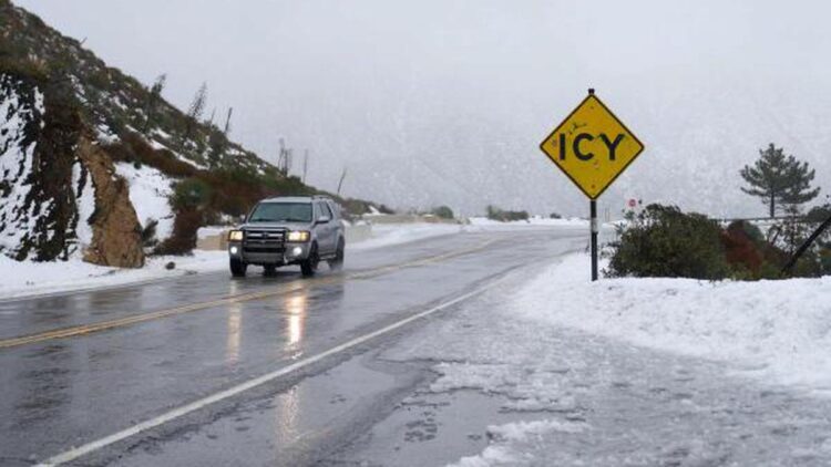 Snow, rain slam California as Michigan shivers without power