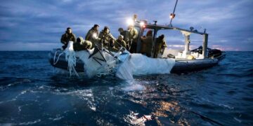 U.S. recovers balloon debris, China protests