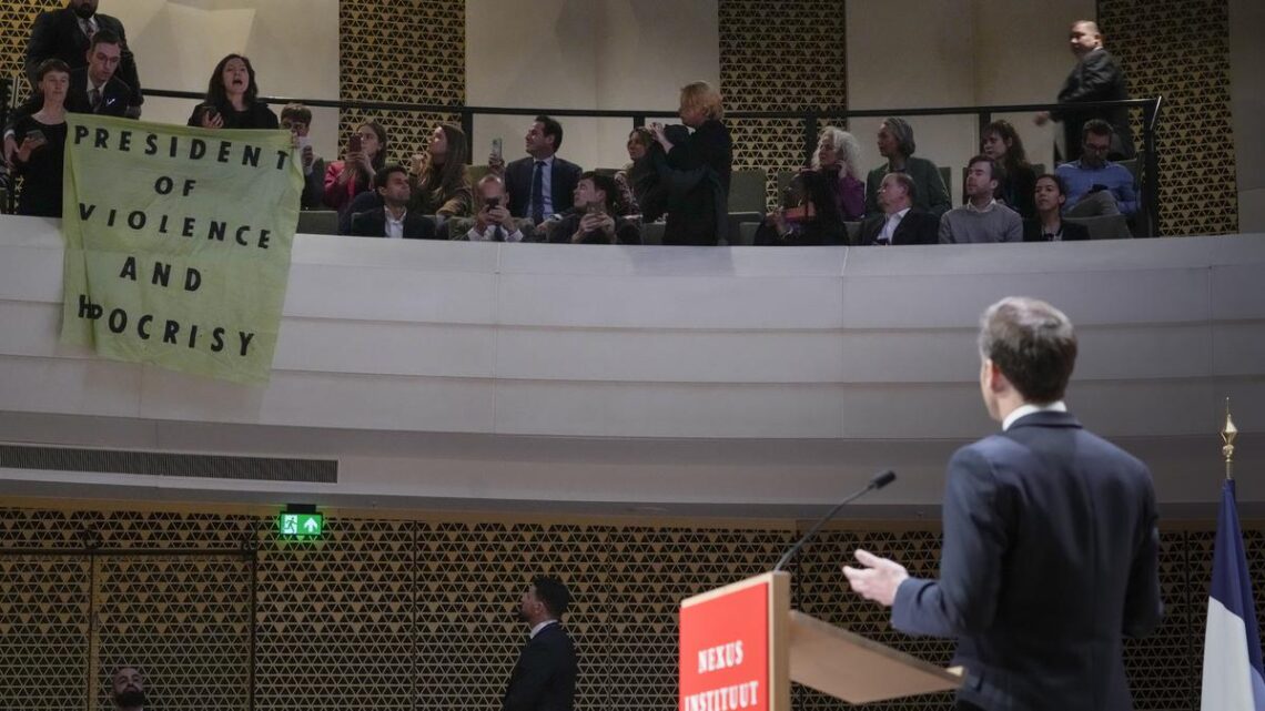 Protesters shout down Macron on visit to the Netherlands
