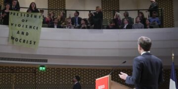 Protesters shout down Macron on visit to the Netherlands
