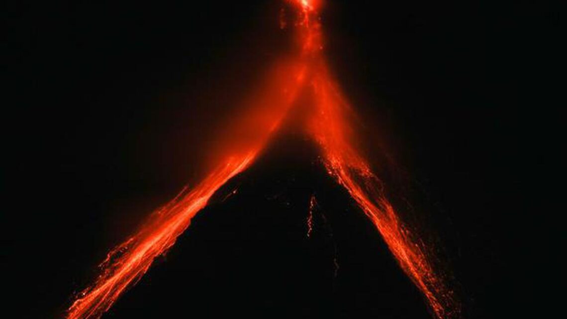 Philippine villagers flee ashfall, sight of red-hot lava from erupting Mayon Volcano Philippine villagers flee ashfall, sight of red-hot lava from erupting Mayon Volcano