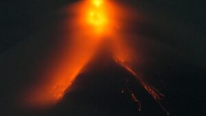 Philippines’ Mayon volcano spews lava down its slopes in gentle eruption putting thousands on alert