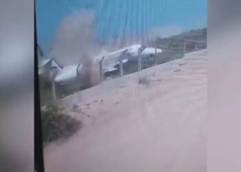 WATCH: Plane skids off runway upon arrival, smashes to pieces on protective barrier