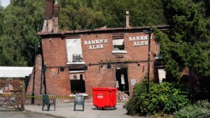 2 men arrested, accused of arson attack on England’s ‘Crooked House pub’