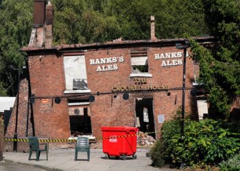 2 men arrested, accused of arson attack on England's 'Crooked House pub'