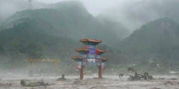 Thousands evacuated as Beijing flooding kills at least 20, leaves 27 others missing