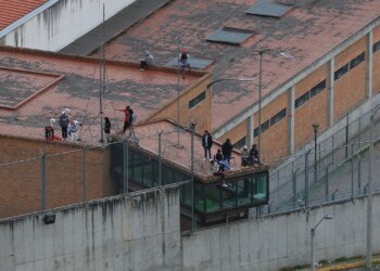 57 guards, officers released in Ecuador following hostage takeover in several prisons, authorities say
