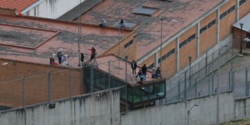 57 guards, officers released in Ecuador following hostage takeover in several prisons, authorities say