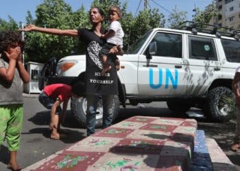 Escalating clashes in Lebanon's largest Palestinian refugee camp leave 5 dead, dozens injured