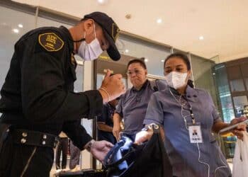 Thai teenager suspected of killing 2 in mall shooting used a modified blank-firing handgun, police say