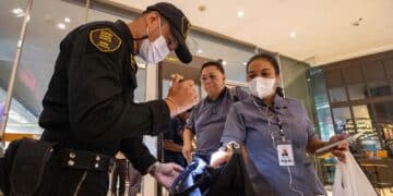 Thai teenager suspected of killing 2 in mall shooting used a modified blank-firing handgun, police say