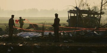 Remains of Thai factory explosion victims taken to temple for identification