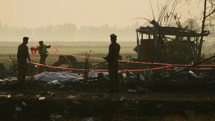 Remains of Thai factory explosion victims taken to temple for identification