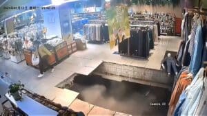 WATCH: Woman falls through floor as possible sinkhole opens up under shopping mall WATCH: Woman falls through floor as possible sinkhole opens up under shopping mall