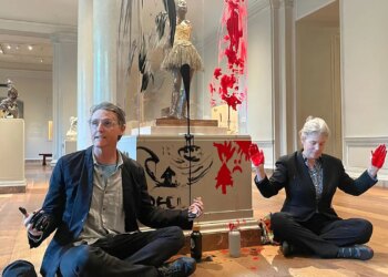 Climate activist charged after smearing paint on sculpture