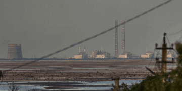 IAEA warns that attacks on a nuclear plant in Russian-controlled Ukraine put the world at risk