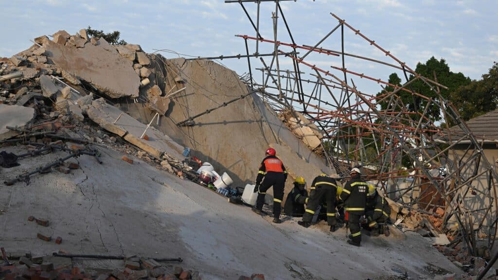 Rescuers Make Contact With 11 Workers Buried Alive In George Building Collapse, SA