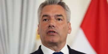 Conservative Austrian chancellor to stay in coalition with left-wing Greens