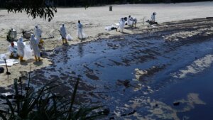 Singapore says ship caused oil spill reported sudden loss of control