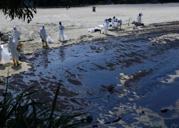Singapore says ship caused oil spill reported sudden loss of control