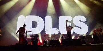 Banksy Hijacks Band’s Show With Refugee Boat Crowd-Surfing Stunt