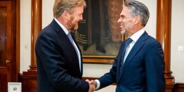 Dutch king swears in a new government 7 months after elections