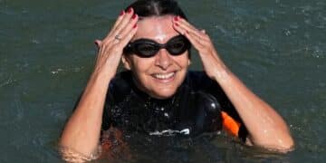 Paris Mayor Swims In Seine River To Prove It's Clean Ahead Of Olympic Games