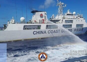 Philippine forces sail to hotly disputed shoal without incident for first time since deal with China