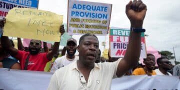 Rights group says security forces have killed 9 as Nigeria protests over hardship enter a second day